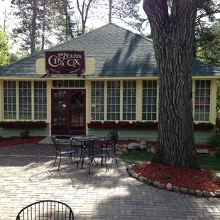 an ice cream cone in front of a building