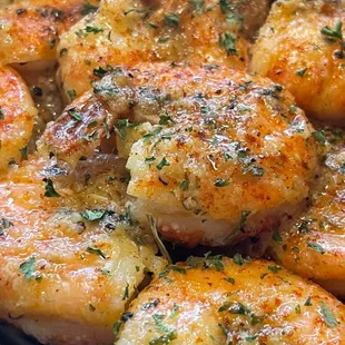 Simmer sautéed shrimp