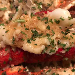 Sautéed lobster with whole roasted garlic crab