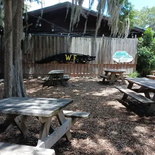 a picnic table and benches