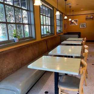 a row of tables in a restaurant