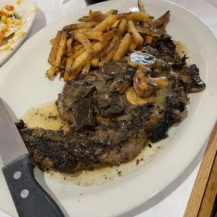 Ranch Hand Ribeye with Mushroom Marsala sauce and fresh-cut fries.