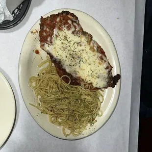 a plate of spaghetti and meat