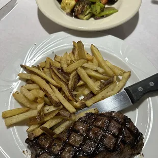 a steak and french fries