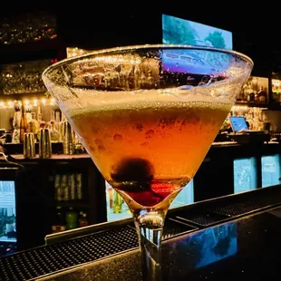 My Bulleit Rye Manhattan (seriously $12! and this was not Happy Hour?) was fantastic and with the correct Luxardo cherry.