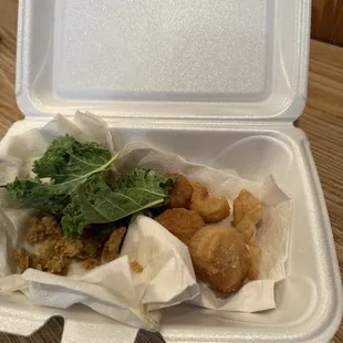 This is what she threw in the box off my plate after I told her the scallops were not good