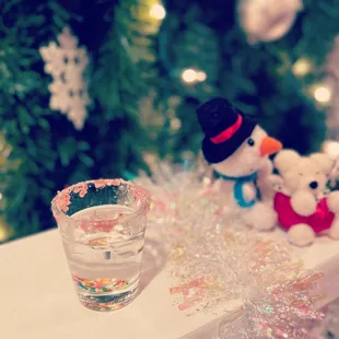 SHOT OF JOY: Vanilla Vodka, Chocolate Liqueur, Peppermint Schnapps with Candy Cane Crumble. A festive delight! Don&apos;t Eat the bear!