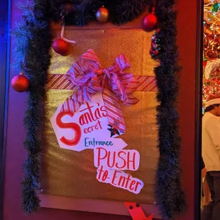 a decorated door with christmas decorations