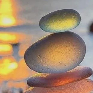 a stack of rocks on the beach