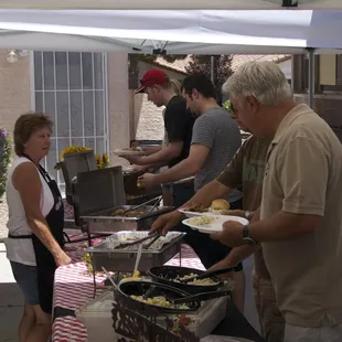 Kathy serving up some of the party grub-