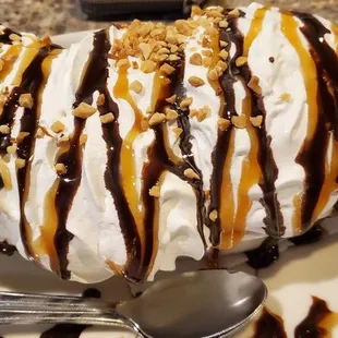 a banana split on a plate