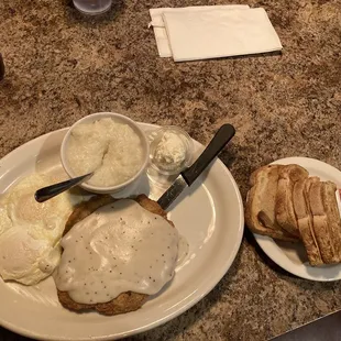 Chicken Fried Steak (4 oz) and Eggs with Sourdough Toast and Grits