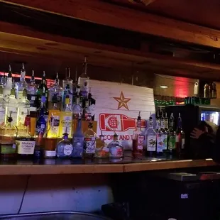 a man and a woman at a bar