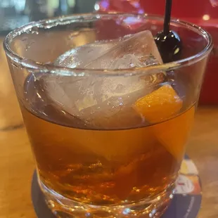 a glass of old fashioned whiskey
