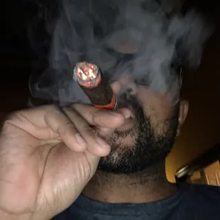 a man smoking a cigar
