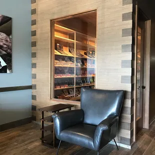 A look into the walk-in humidor from the front seating area.