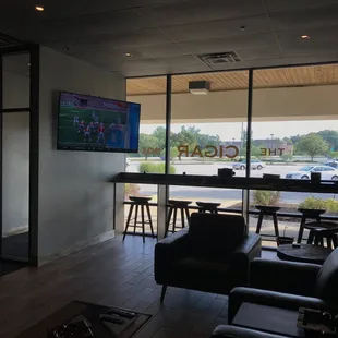 Seating along front windows with power for laptops, tablets, and phones.