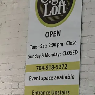 a sign for the cigar loft
