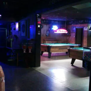 a pool table in a bar