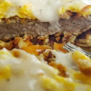 That&apos;s a thick country fried steak in there