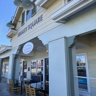 A couple tables out front for outdoor dining