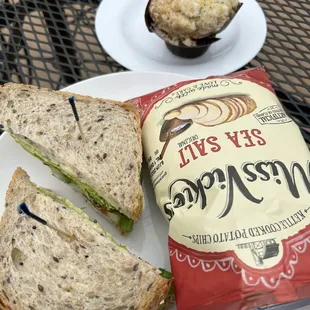 a sandwich and a muffin