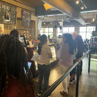 Ordering in the lunch line at the counter.