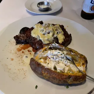 Delmonico steak Oscar Style with loaded baked potato