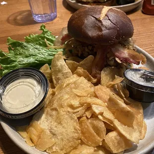 Build your own motherlode burger on a pretzel bun with homemade chips