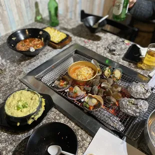 Steamed egg, mayonnaise corn, scallops, clams, mussels, oysters, and marinated scallops