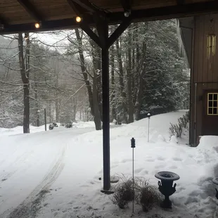 a view of a snow covered driveway