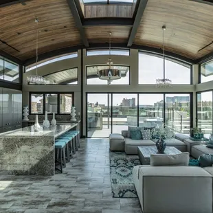 Bright rooftop-level mini-kitchen and sitting area