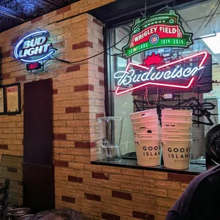 Interior ambiance and neon advertising of Saint Louis brewskis and that old wriggling baseball diamond nearby