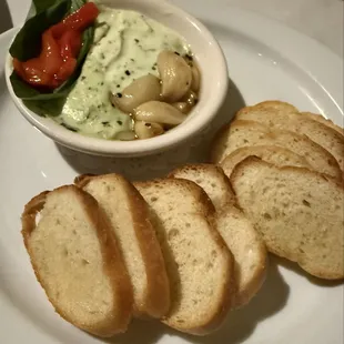 Roasted garlic with sweet red peppers and a goat cheese dip