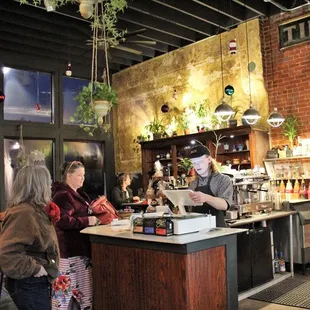 a man and a woman at a bar