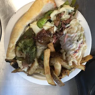 This is our BIG Cleveland Hoagie, two meats Corned Beef and Beef Brisket ! Peppers,onions and mushroom Topped with Swiss cheese!
