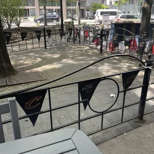 Debris all over ground, large outdoor seating area.