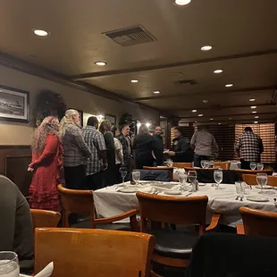 a group of people in a restaurant