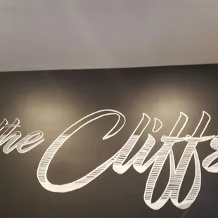 a sign for the cliffs