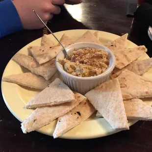 Hummus.. think it was chickpea and tahini and it was a little spicy.