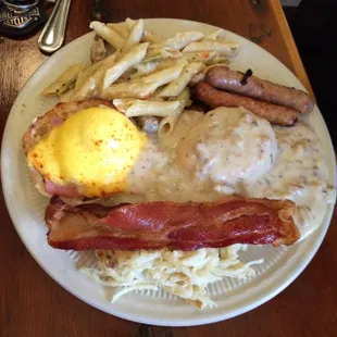 Now that&apos;s a buffet plate!!  Not mine... Seriously!!   Look at that eggs Benedict!!