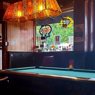 a billiards table and a pool table