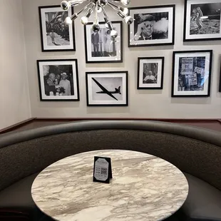 cute table with JFK pics behind