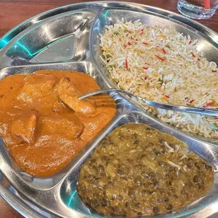 Lunch portion: black dal, chicken makahni, rice, naan (not pictured)