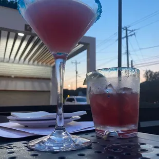 two cocktails on a table