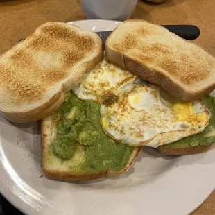 Egg Avocado Toast with extra toast and 2 eggs