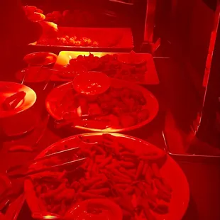a row of pizzas on a table