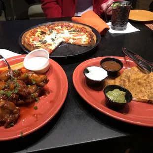 three plates of food on a table