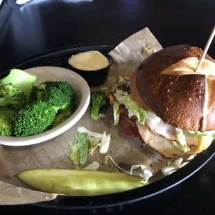 Dilly Dilly Club sandwich with a side of broccoli.