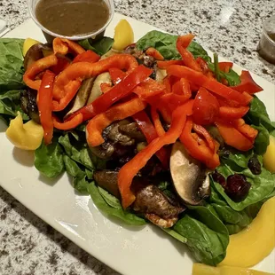 Spinach salad with warm portobello mushrooms and balsamic on side